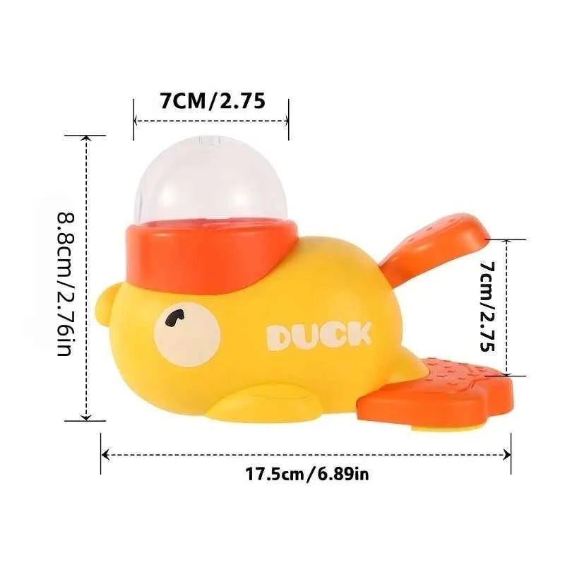 Yellow duck-shaped manual cat treat dispenser with clear dome lid and orange press plate