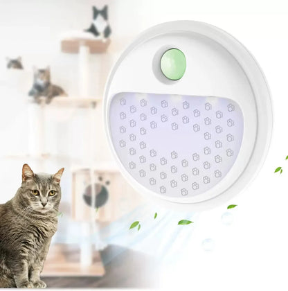 Close-up ozone & UV air purifier, round white housing with green button and purple light