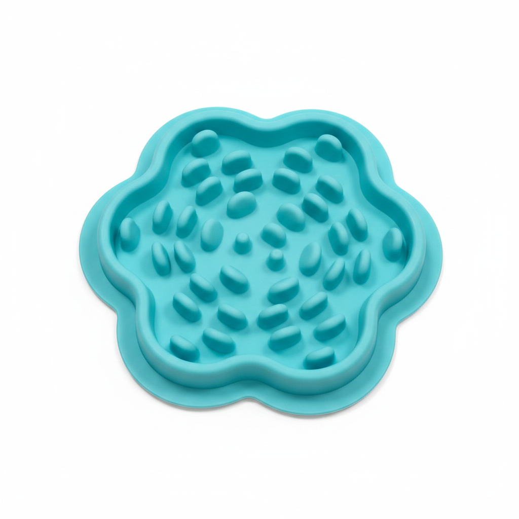 Teal silicone slow feeder bowl with raised feeding ridges and nibs
