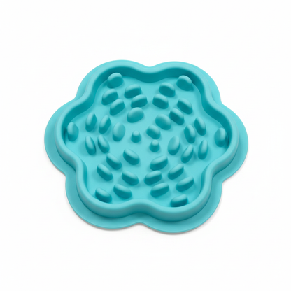 Teal silicone slow feeder bowl with raised feeding ridges and nibs