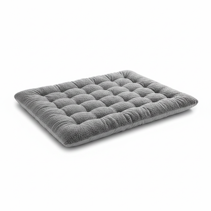 Gray plush sofa-style dog bed cushion with quilted, raised texture
