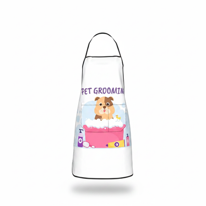 White pet grooming apron with central cartoon dog, pink bottom panel, adjustable strap