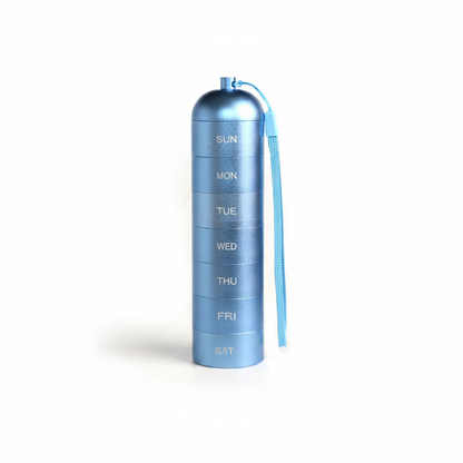 Blue waterproof weekly pill organizer in cylindrical aluminum case with wrist strap and day labels